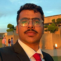 Faisal Alqutaiti headshot