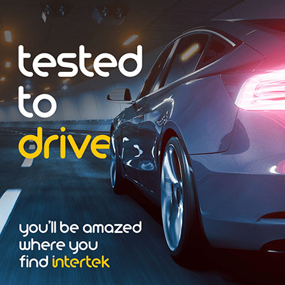 The rear quarters of a car on the road